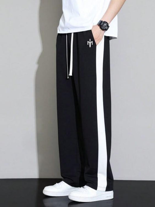STRIPED TRACKS PANTS MNSWRD